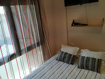 Cama o camas de una habitación en Apartamento en Escarrilla, sallent de gallego