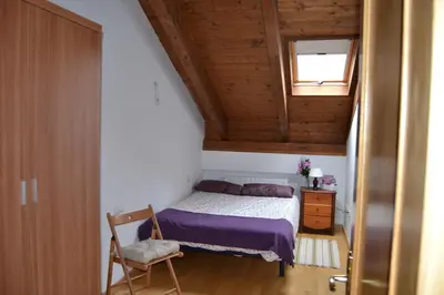 Cama o camas de una habitación en Apartamentos Portal de Ordesa