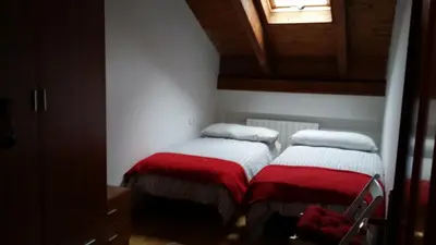 Cama o camas de una habitación en Apartamentos Portal de Ordesa