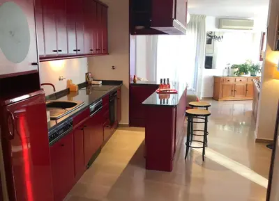 Una cocina o zona de cocina en Loft acogedor con terraza y parking en el centro