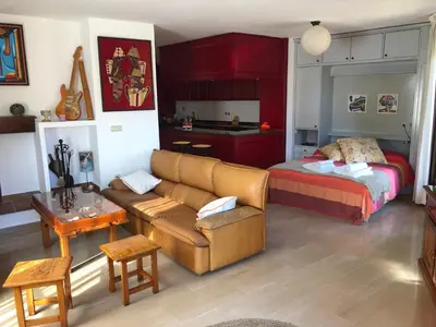 Cama o camas de una habitación en Loft acogedor con terraza y parking en el centro