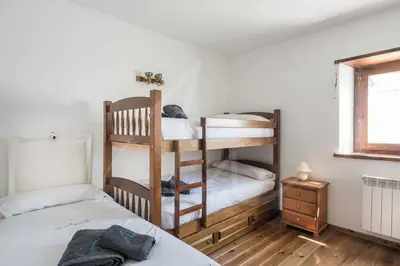 Cama o camas de una habitación en Aiguamoig by SeaMount Rentals