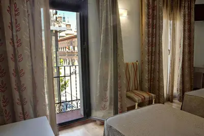 Cama o camas de una habitación en Hotel Tibur