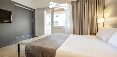 Cama o camas de una habitación en Ilunion Romareda