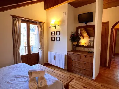 Cama o camas de una habitación en El Dúplex de Espot - L'Amfitriona