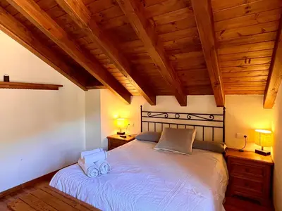 Cama o camas de una habitación en El Dúplex de Espot - L'Amfitriona