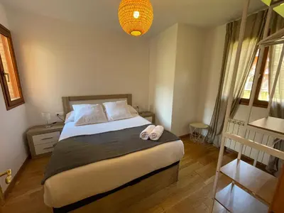 Cama o camas de una habitación en ACOGEDOR PISO EN SORT CON PISCINA