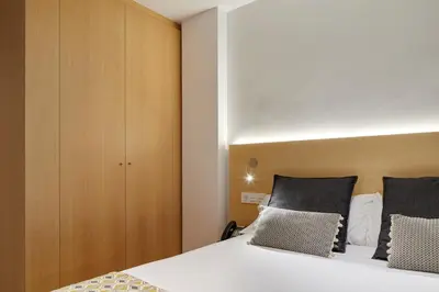 Cama o camas de una habitación en Hostal Arriazu
