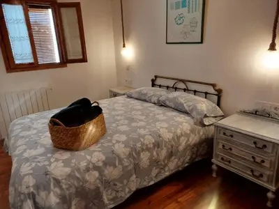 Cama o camas de una habitación en El Desván del Campanero
