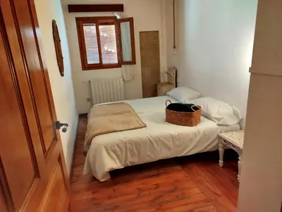 Cama o camas de una habitación en El Desván del Campanero