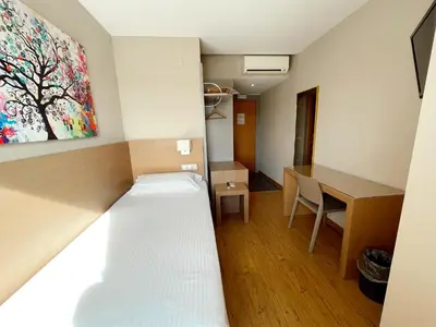Cama o camas de una habitación en Nuevo Zenit Calahorra