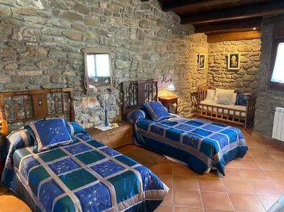 Cama o camas de una habitación en Casa rural CAL SERRA