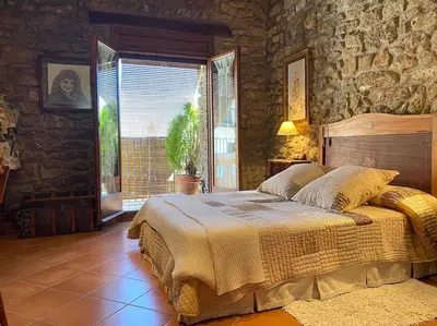 Cama o camas de una habitación en Casa rural CAL SERRA