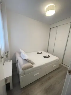 Cama o camas de una habitación en Apartamento centro con parking privado