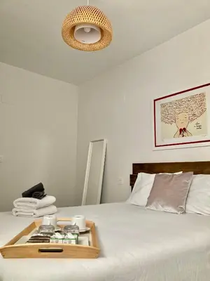 Cama o camas de una habitación en Apartamento centro con parking privado
