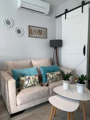 Zona de estar de Apartamentos Nenufar