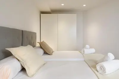 Cama o camas de una habitación en Alojamiento Maite Jaca