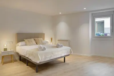Cama o camas de una habitación en Alojamiento Maite Jaca