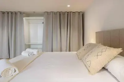 Cama o camas de una habitación en Alojamiento Maite Jaca