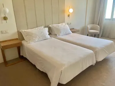 Cama o camas de una habitación en Hotel Oriente