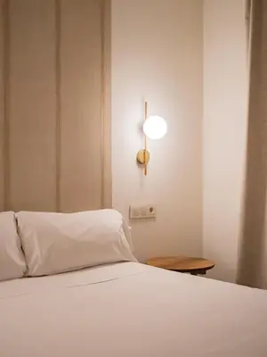 Cama o camas de una habitación en Hotel Oriente