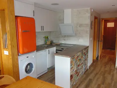 Una cocina o zona de cocina en Apart Centro Formigal - WOWRURAL