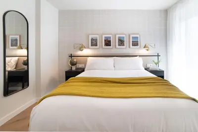 Cama o camas de una habitación en Apartamentos4U Tudela Plaza Parking Incluido