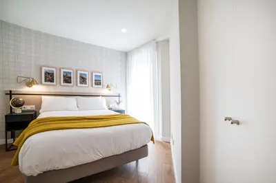 Cama o camas de una habitación en Apartamentos4U Tudela Plaza Parking Incluido