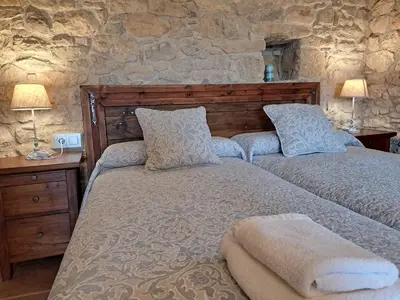 Cama o camas de una habitación en Casa Moliner