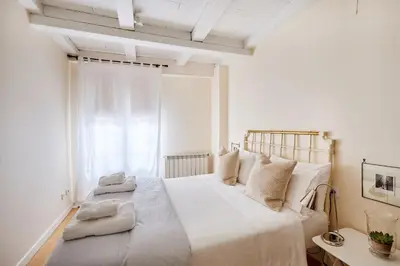 Cama o camas de una habitación en Centro historico,Atico con encanto con vistas a los Encierros de San Fermin