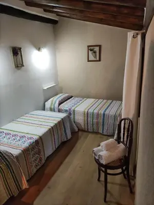 Cama o camas de una habitación en El Castellá