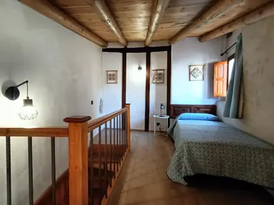 Cama o camas de una habitación en El Castellá