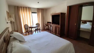 Cama o camas de una habitación en La Figuerola Hotel & Restaurant