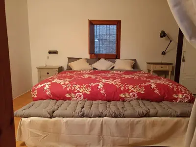 Cama o camas de una habitación en Casa acogedora con barbacoa