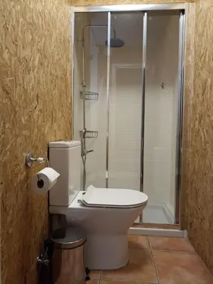 Un baño de Casa acogedora con barbacoa