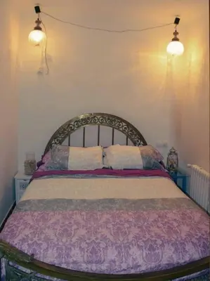Cama o camas de una habitación en Casa acogedora con barbacoa