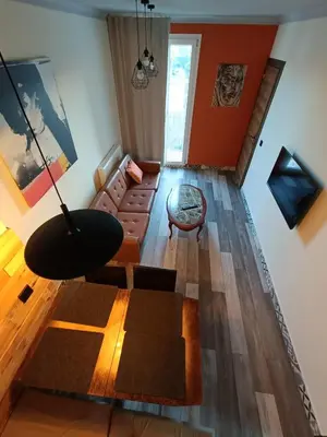 Una televisión o centro de entretenimiento en Cal Perico, apartamento para turistas y escaladores