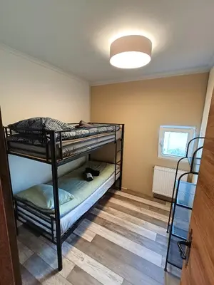 Cama o camas de una habitación en Cal Perico, apartamento para turistas y escaladores
