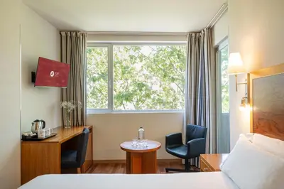 Cama o camas de una habitación en Exe Plaza Delicias