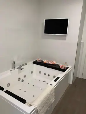 Una televisión o centro de entretenimiento en Casa hugo olite
