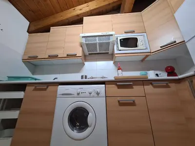 Una cocina o zona de cocina en Dos Torres Númenor Ático Abuhardillado