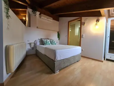 Cama o camas de una habitación en Dos Torres Númenor Ático Abuhardillado