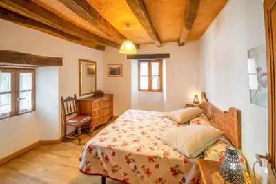 Cama o camas de una habitación en Espacioso apartamento en el Pirineo Navarro