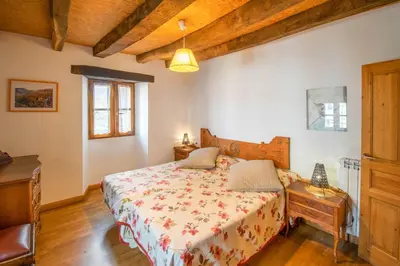 Cama o camas de una habitación en Espacioso apartamento en el Pirineo Navarro
