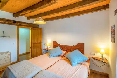Cama o camas de una habitación en Espacioso apartamento en el Pirineo Navarro