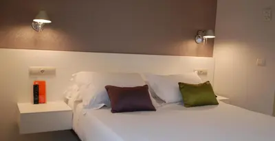 Cama o camas de una habitación en Hotel Andia
