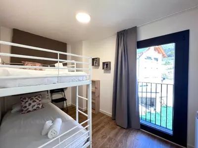 Cama o camas de una habitación en Espot Cowork & Apartments - L'Amfitriona