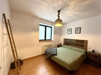 Cama o camas de una habitación en Apartament La Gisca - L'Amfitriona