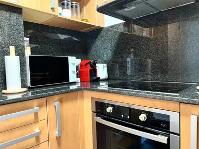 Una cocina o zona de cocina en Apartament La Gisca - L'Amfitriona