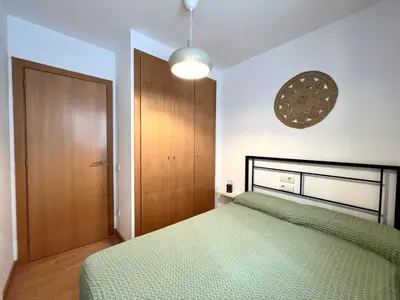 Cama o camas de una habitación en Apartament La Gisca - L'Amfitriona